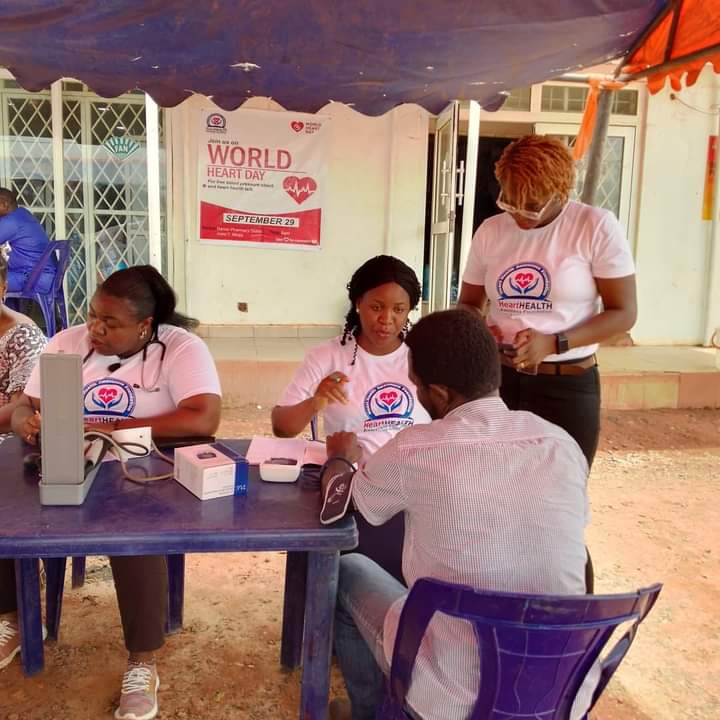 a group of nurses performing blood test